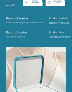 Detail view of octagonal velvet pearl necklace gift box in light blue with interior straps