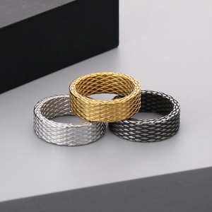 Detailed view of three-piece set with dragon scale texture in gold, silver, and black