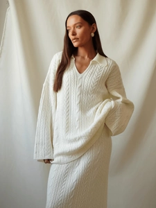 Retro cable knit sweater dress with lapel collar in a creamy white minimalist style