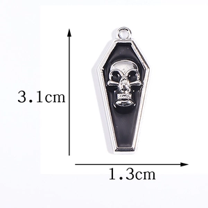 Gothic vampire skull coffin pendant in black and silver, size 3.1cm by 1.3cm