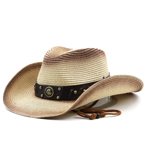Detail of western straw hat featuring gradient tones and rivet leather band decoration