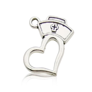 Detail of silver nurse hat charm with heart and cross icon for medical DIY jewelry