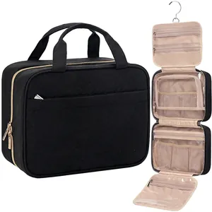 Detail showing hanging waterproof toiletry bag with four compartments and metal hook