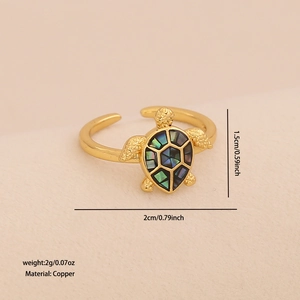 Detailed macro view showing the turtle ring dimensions and natural shell inlay