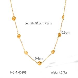 Detail view of 18K gold hammered disk necklace with dimensions and weight measurements