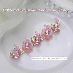 Macro view of aurora glitter resin nail art stand set with heart floral base dimensions