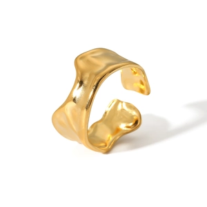Irregular gold lava textured open ring in stainless steel with a metallic foil finish