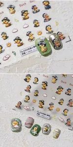 Detailed macro view of 3D embossed duck nail stickers showing raised texture and floral patterns
