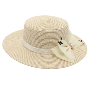 Elegant wide brim straw boater hat for women with large pearl chiffon bow detail