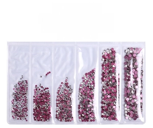 Macro detail of red back nail crystals in a 6-grid pack with 1440 pieces and silver base
