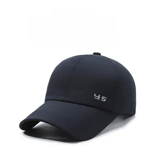 Detail of navy blue baseball cap with side laser-cut ventilation holes and YS logo
