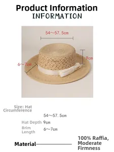 Detail view of 100% raffia straw hat showing dimensions and soft woven texture