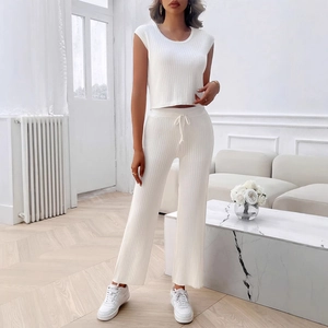 Women's white knitted two-piece set with short sleeve top and ribbed wide-leg trousers