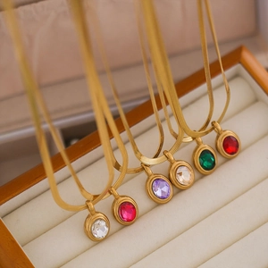 Flat snake chain necklaces set with colorful oval zircon pendants in gold finish