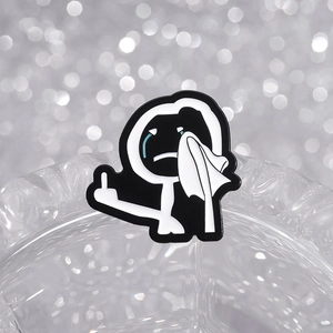 Minimalist stickman enamel pin with blue tears on a sleek metallic finish badge