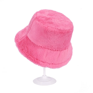 Close-up of soft pink cashmere bucket hat showing fluffy plush material texture and warmth