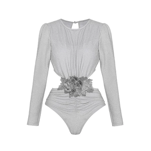 Detailed view of silver long sleeve bodysuit featuring waist cutout and 3D floral accents