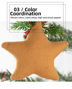 Close-up of brown star felt ornament with red string hanging on green pine branch