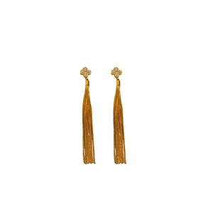 Elegant gold four-leaf flower earrings with zircon pavé and long tassel chain drop