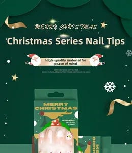 Détails de faux ongles de Noël avec motifs de pull blanc et designs de bonshommes de neige