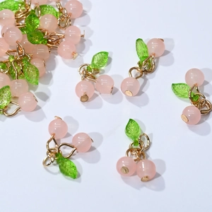 Pink translucent cherry pendant charms with green leaves and gold rings for DIY jewelry