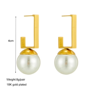 Elegant 18K gold plated L-shaped earrings with large white pearls on white background