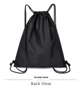 Detail of black drawstring backpack showing the waterproof diamond grid texture