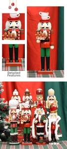Close-up of hand-painted details on wooden Nutcracker soldiers for Christmas decor