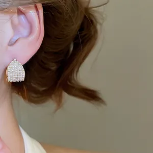 Elegant French vintage style gold earrings with zircon crystals and pearls for women
