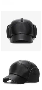 Detail view of black PU leather winter baseball cap with plush ear flaps for men