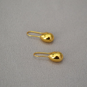 Polished gold teardrop earrings for women with a minimalist mirror finish design