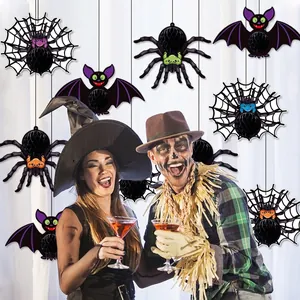 Halloween hanging honeycomb paper decorations featuring black spiders and purple bats