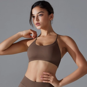 Detailed view of brown seamless ribbed sports bra and high-waist yoga leggings set