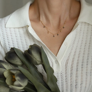 Double-layered 18K gold plated vintage necklace with blue beads and dainty pendants