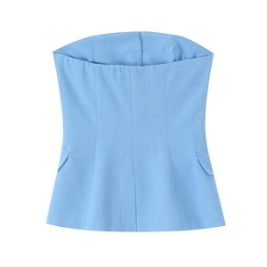 Light blue peplum tube top detail showing woven fabric texture and cinched waist design
