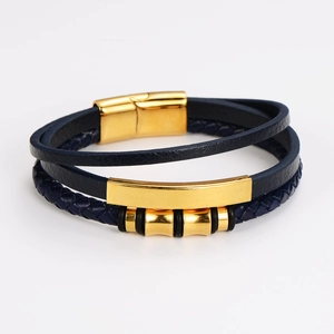 Close-up of dark blue multilayer leather bracelet with a gold magnetic clasp