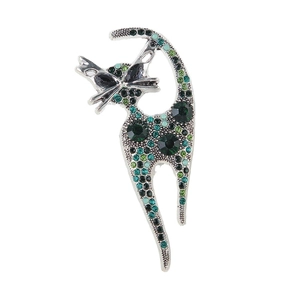 Vintage cat brooch with green and black rhinestones on a silver base for women