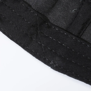 Detailed view of durable black embroidered baseball cap with reinforced stitching patterns