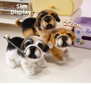 Three plush pug and bulldog puppies size demonstration showing 22cm length measurement