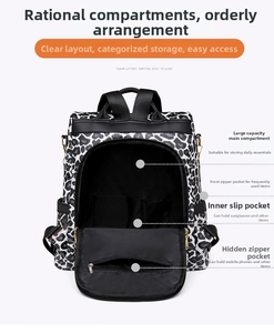 Detailed view of leopard print backpack interior compartments and storage pockets