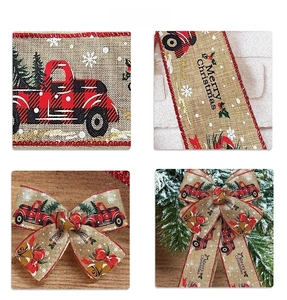 Detail of Christmas burlap ribbon with red plaid truck print and festive Merry Christmas text