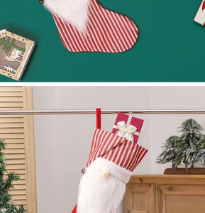 Detail of Christmas gnome stocking with red and white stripes and faux fur trim