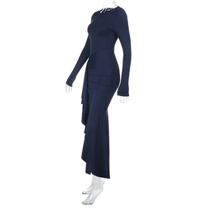 Detail of navy blue slim-fit dress showing elegant side draping and ruched fabric textures