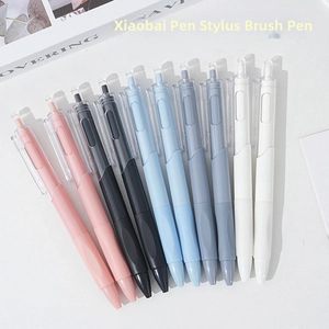 Close-up of assorted matte color retractable gel pens with ST needle tip for smooth writing