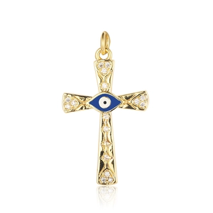 Detail of gold cross pendant with blue evil eye center and sparkling cubic zirconia stones