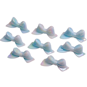 Luminous light blue 3D bow charms with pearlescent finish for DIY and nail art