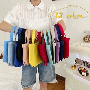 Minimalist canvas tote bags for women available in 12 vibrant colors for daily lunch or storage