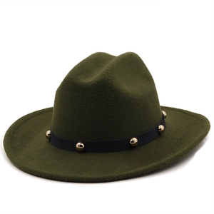 Detail of dark green wool felt fedora with black leather band and gold stud accents
