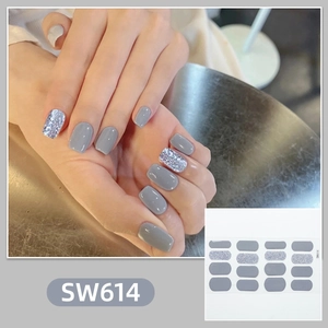 Detail of SW614 nail stickers in solid grey and silver glitter with model hand display