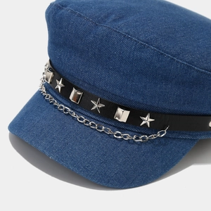 Vintage navy flat cap in dark blue denim featuring silver star rivets and chain detail